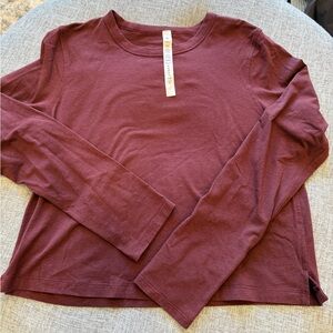 Lululemon classic fit long sleeve.  Women’s size 6.  Color garnet/maroon